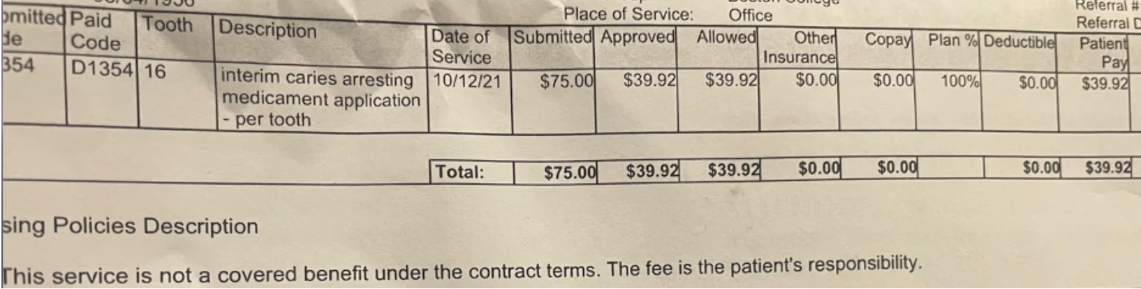 Dental insurance claim statement showing a $39.92 interim caries-arresting (SDF) treatment listed as not a covered benefit