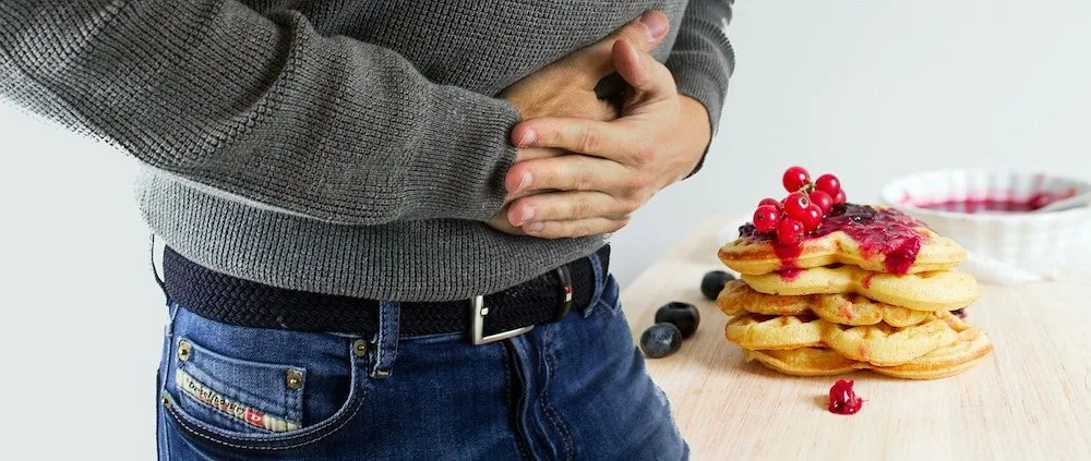 Illustration for the lesson on managing common digestive side effects of weight-loss drugs, like nausea and heartburn.