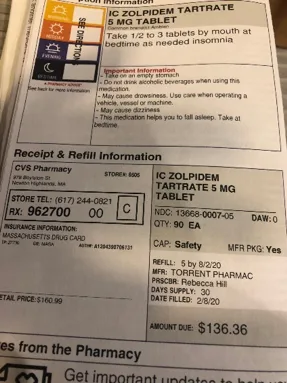 Photo of a CVS pharmacy label for zolpidem (generic Ambien) showing a $160.99 retail price